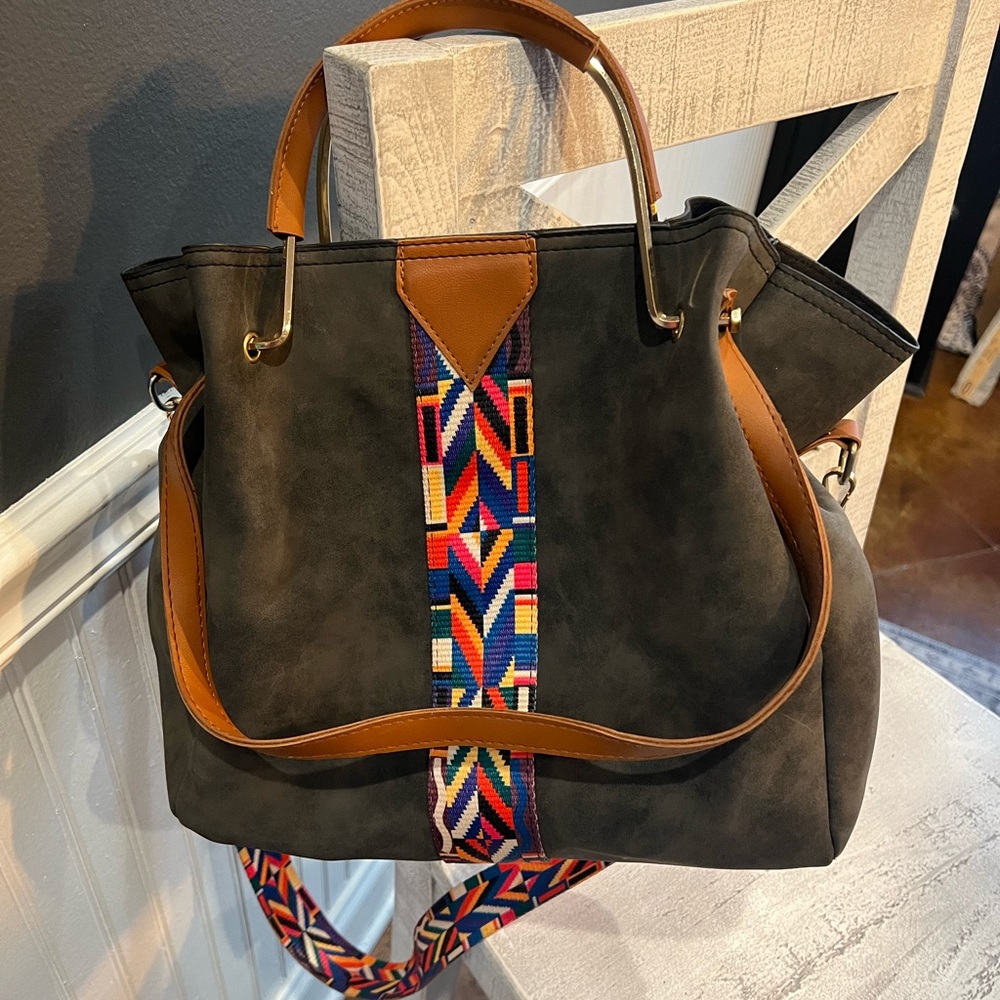 Purse with guitar strap.